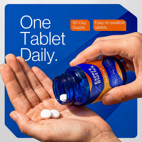 Bouteille Expert Biotics Iodine+ sur une table avec une tasse d'eau