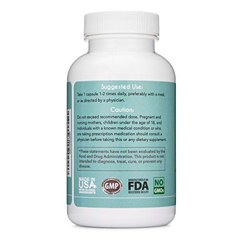 Bouteille Lifted Naturals Probiotiques sur une table en bois