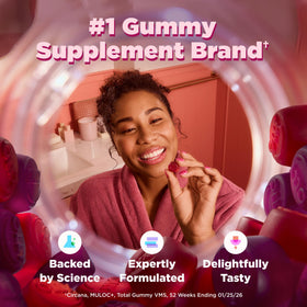 Bouteille OLLY avec gummies sur une surface en bois
