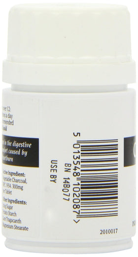 Bragg Charbon Actif 300mg comprimés sur une surface blanche