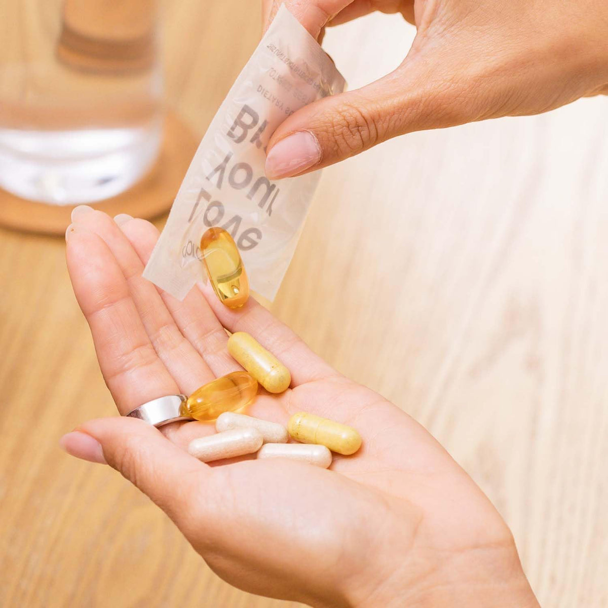 BrainMD Brain & Body Power Max capsules en main
