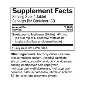 BrainMD SAMe 400 mg comprimés sur table avec verre d'eau