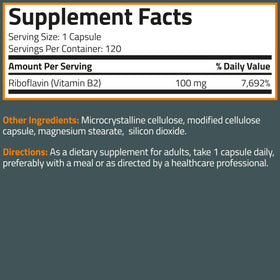 Bronson Vitamine B2 100mg capsules végétariennes à côté d'un verre d'eau