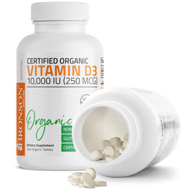 Bronson Vitamine D3, comprimés dans une main