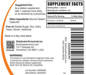 BulkSupplements N-Acetyl L-Cysteine 600mg capsules on a wooden table