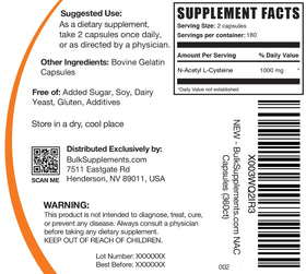BulkSupplements NAC 1000 mg Capsules on a wooden table