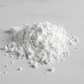 Calcium Lactate PURE ORIGINAL INGREDIENTS sur une surface en bois