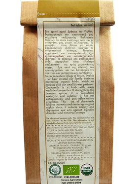 Camomille grecque bio sur une table en bois