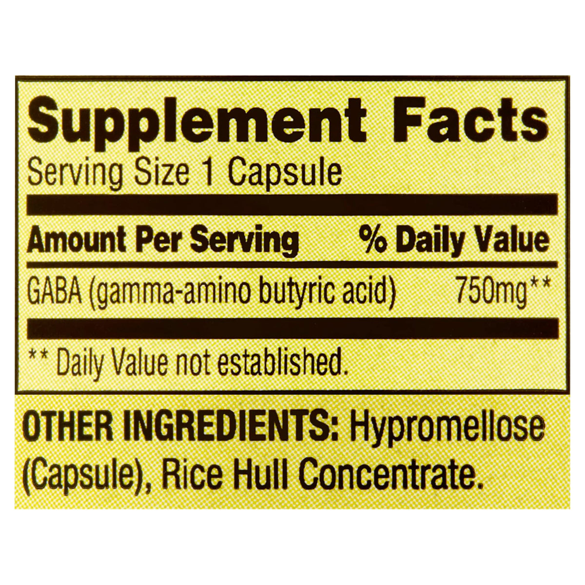 Capsule de LUAL GABA 750mg sur une surface blanche