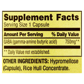 Capsule de LUAL GABA 750mg sur une surface blanche