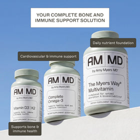 Capsules Amy Myers MD D3/K2 sur une table en bois