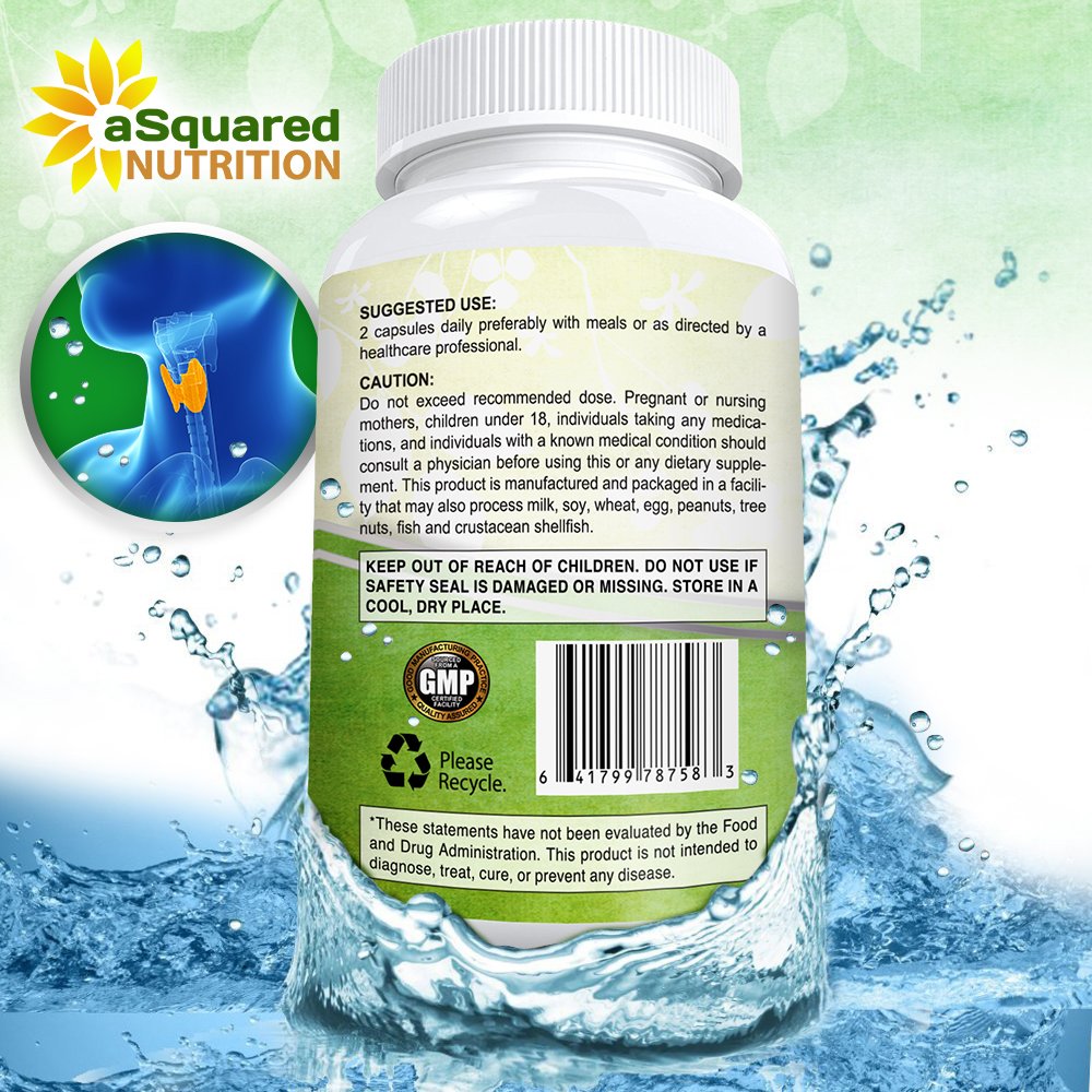 Capsules aSquared Nutrition sur une surface en bois