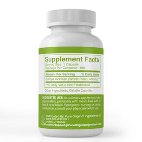 Capsules Bacopa Monnieri sur une table avec feuillage