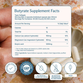 Capsules BodyBio Butyrate Calcium Magnesium sur une surface en bois