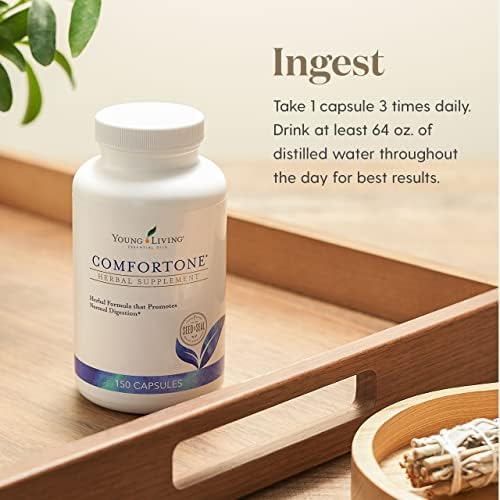 Capsules ComforTone Young Living sur une surface en bois