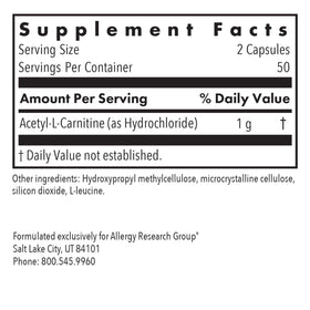 Capsules d'Acétyl L-Carnitine sur fond blanc