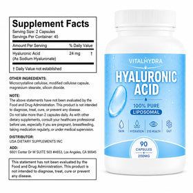 Capsules d'acide hyaluronique Vitalhydra sur une surface blanche