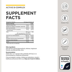 Capsules d'Active B-Complex sur une surface blanche
