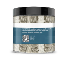 Capsules d'Earthborn Elements Psyllium Husk sur une surface blanche