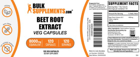 Capsules d'extrait de betterave dans un verre d'eau