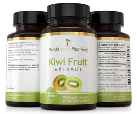 Capsules d'extrait de kiwi sur une table en bois
