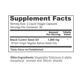 Capsules d'huile de graines de cumin noir NusaPure sur une surface blanche