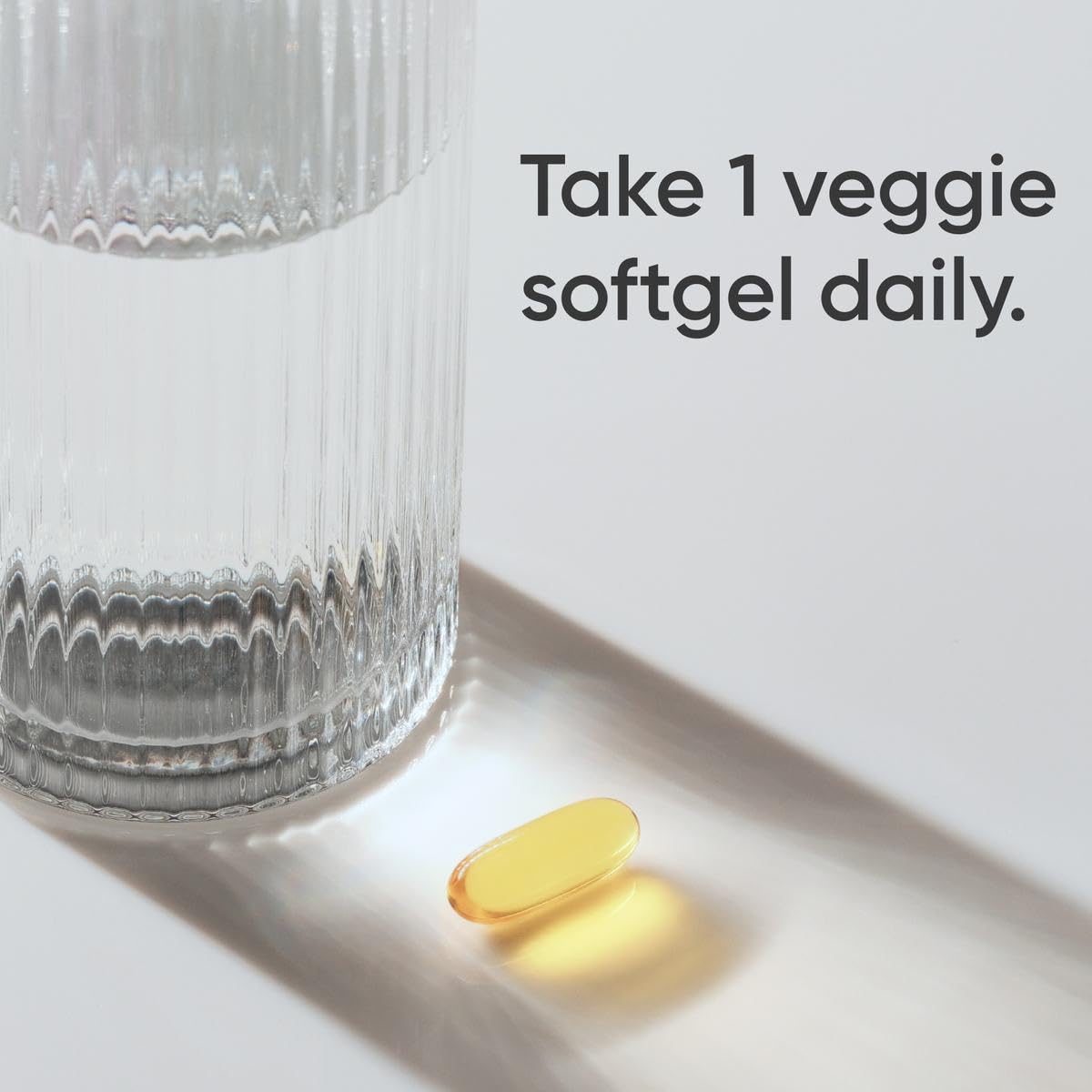 Capsules d'huile de lin Vegan Sports Research sur fond blanc