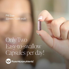 Capsules D-Mannose 900mg avec canneberge sur une table