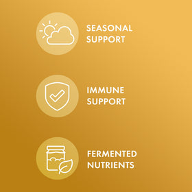 Capsules de Beta Glucans de Dr. Mercola sur une surface blanche