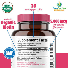 Capsules de biotine 5000 MCG LifeGarden Naturals sur une surface en bois