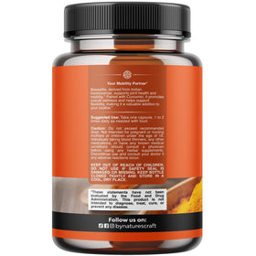 Capsules de Boswellia et Curcuma Natures Craft sur une surface blanche