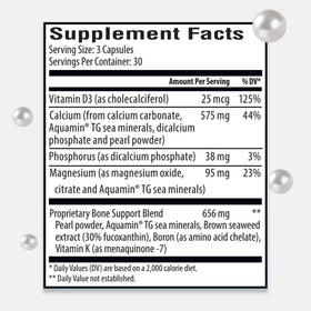 Capsules de calcium marin Expert Remedies sur une surface en bois