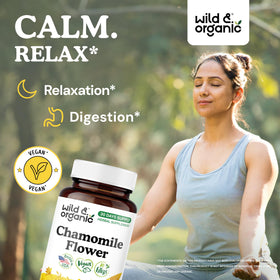 Capsules de camomille Wild & Organic sur une surface en bois