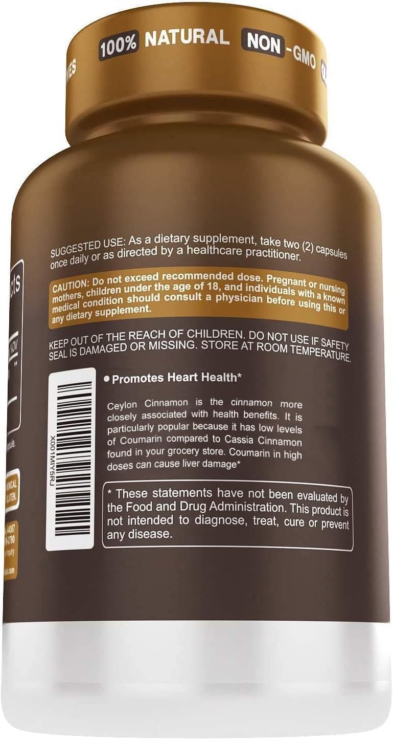 Capsules de Cannelle de Ceylan Herbtonics sur une table en bois