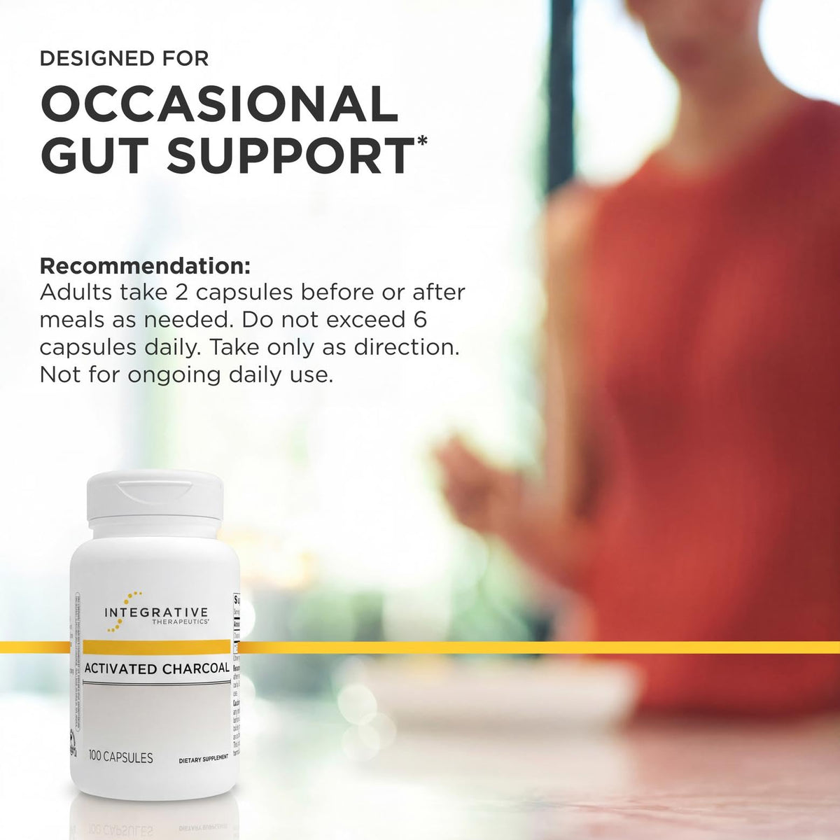 Capsules de charbon actif dans une main