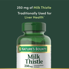 Capsules de Chardon-Marie Nature's Bounty 250 mg, une capsule sur une cuillère