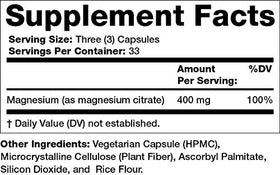 Capsules de citrate de magnésium Olympian Labs sur fond blanc
