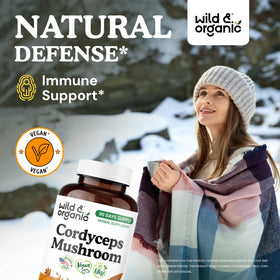 Capsules de cordyceps Wild & Organic sur une surface blanche