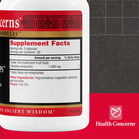 Capsules de Coriolus PS de Health Concerns sur une surface blanche