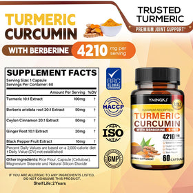 Capsules de Curcuma YMINGKJ dans une main