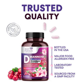 Capsules de D-Mannose 1300mg avec cranberry dans une cuillère