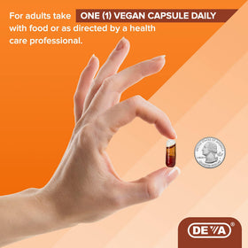 Capsules de DEVA Huile de Graine de Citrouille sur une table en bois