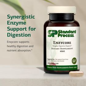 Capsules de Enzycore sur une surface blanche