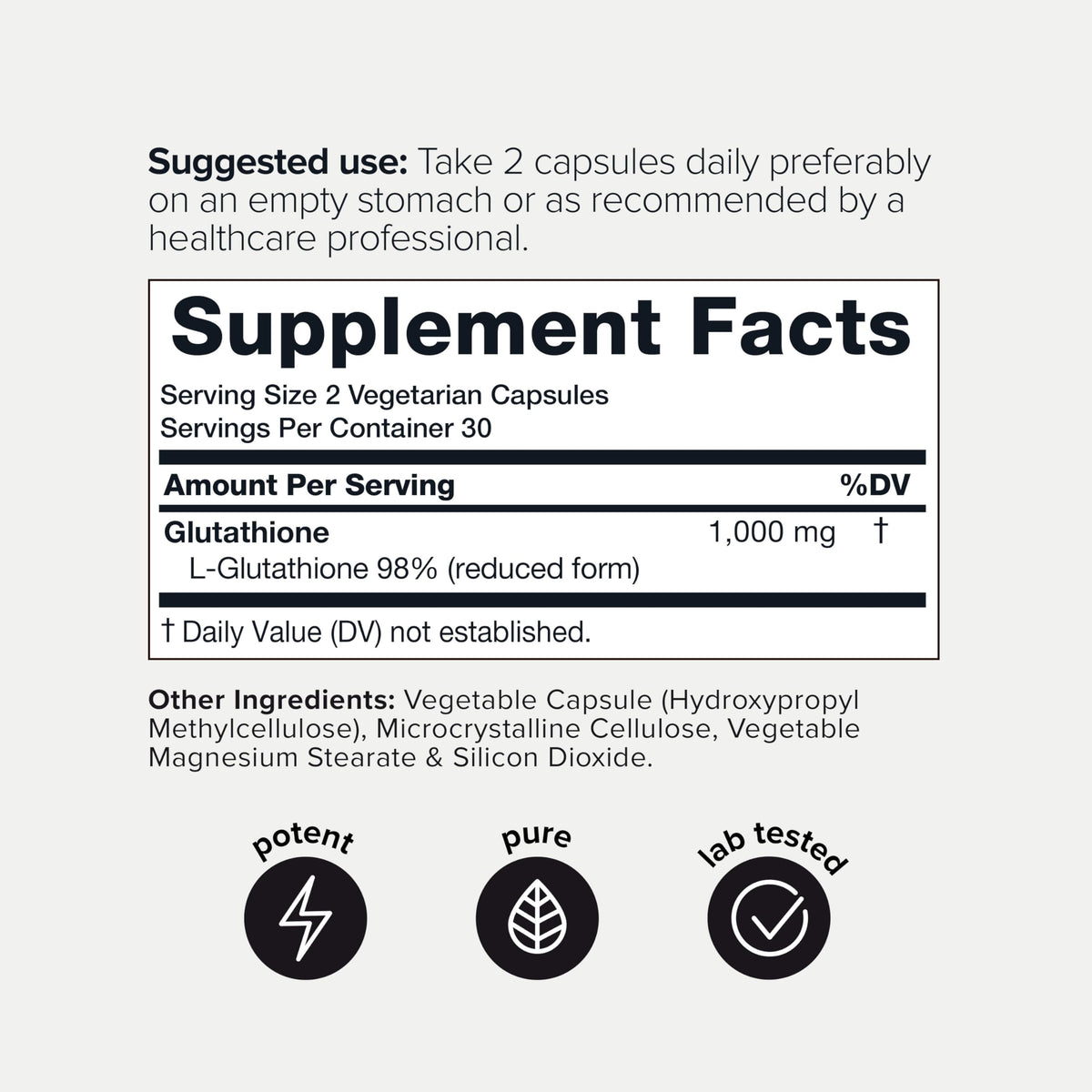 Capsules de glutathione Toniiq à côté d'un verre d'eau