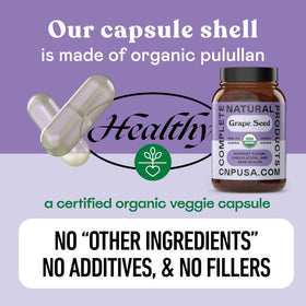 Capsules de graines de raisin bio sur une table en bois
