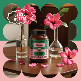 Capsules de hibiscus bio Complete Natural Products sur une surface en bois