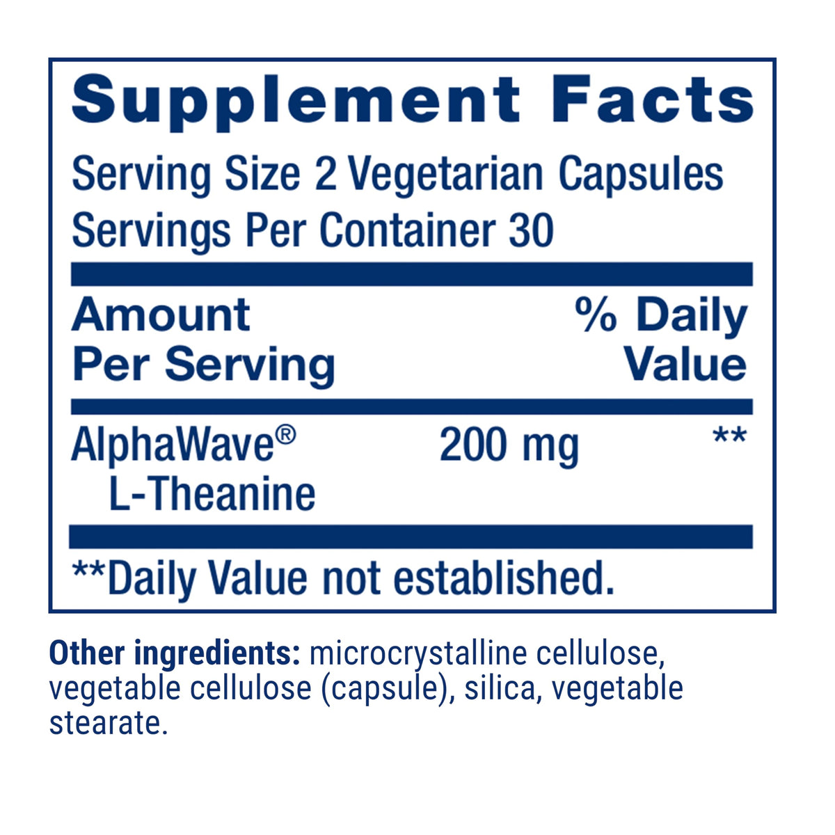 Capsules de L-Theanine de Life Extension sur une surface blanche