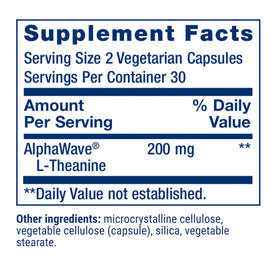 Capsules de L-Theanine de Life Extension sur une surface blanche