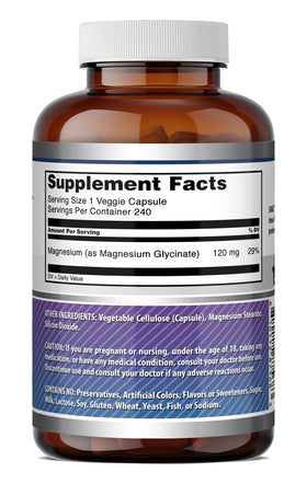 Capsules de Magnésium Glycinate Amazing Nutrition sur une table en bois