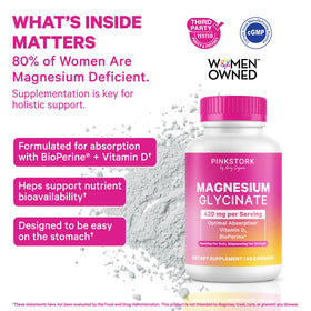 Capsules de magnésium glycinate Pink Stork sur une surface blanche